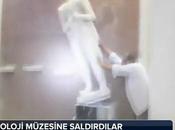 Isis take sledgehammers priceless Assyrian artefacts Mosul museum